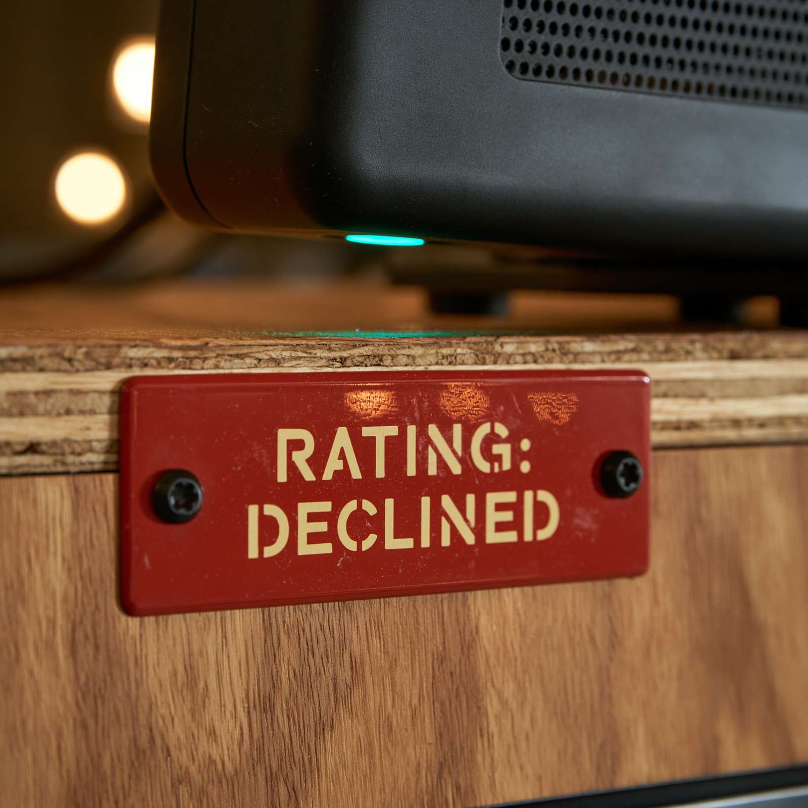 The RATING: DECLINED plaque beneath a sensor