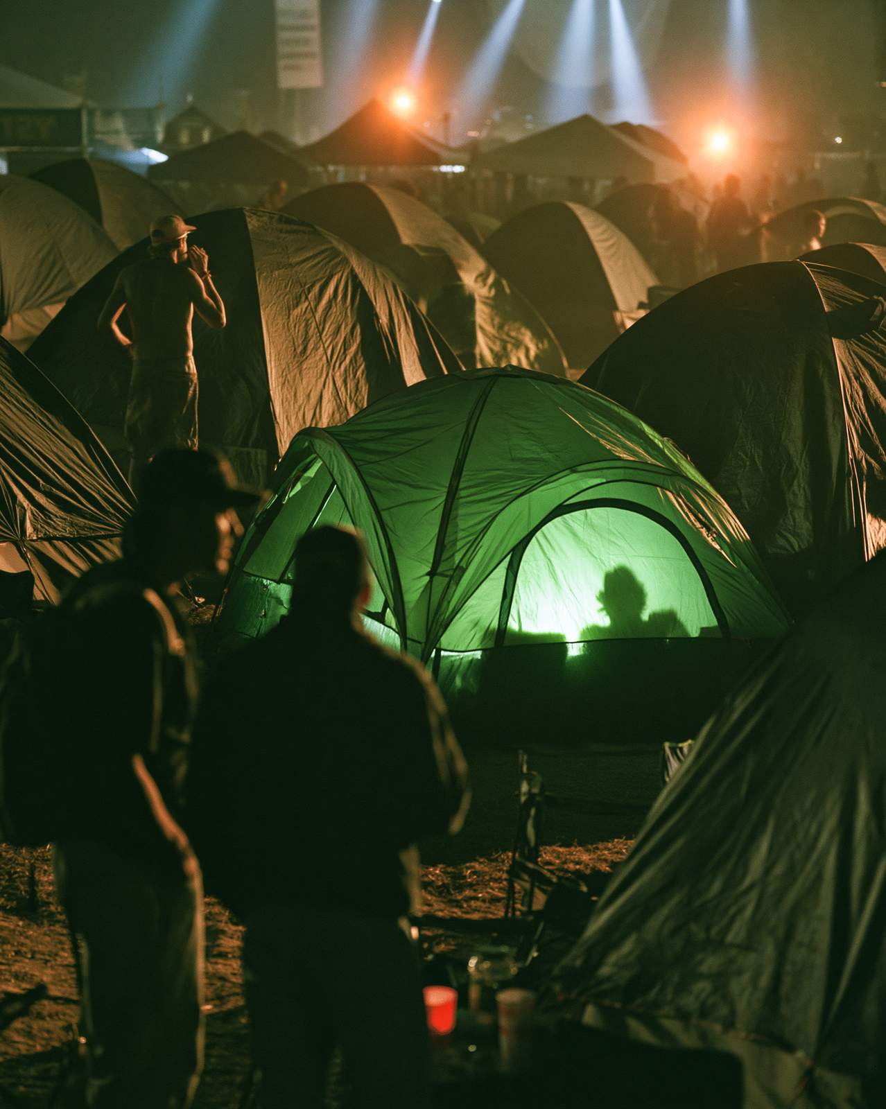 One tent, glowing green, Campground North, 1:40 AM